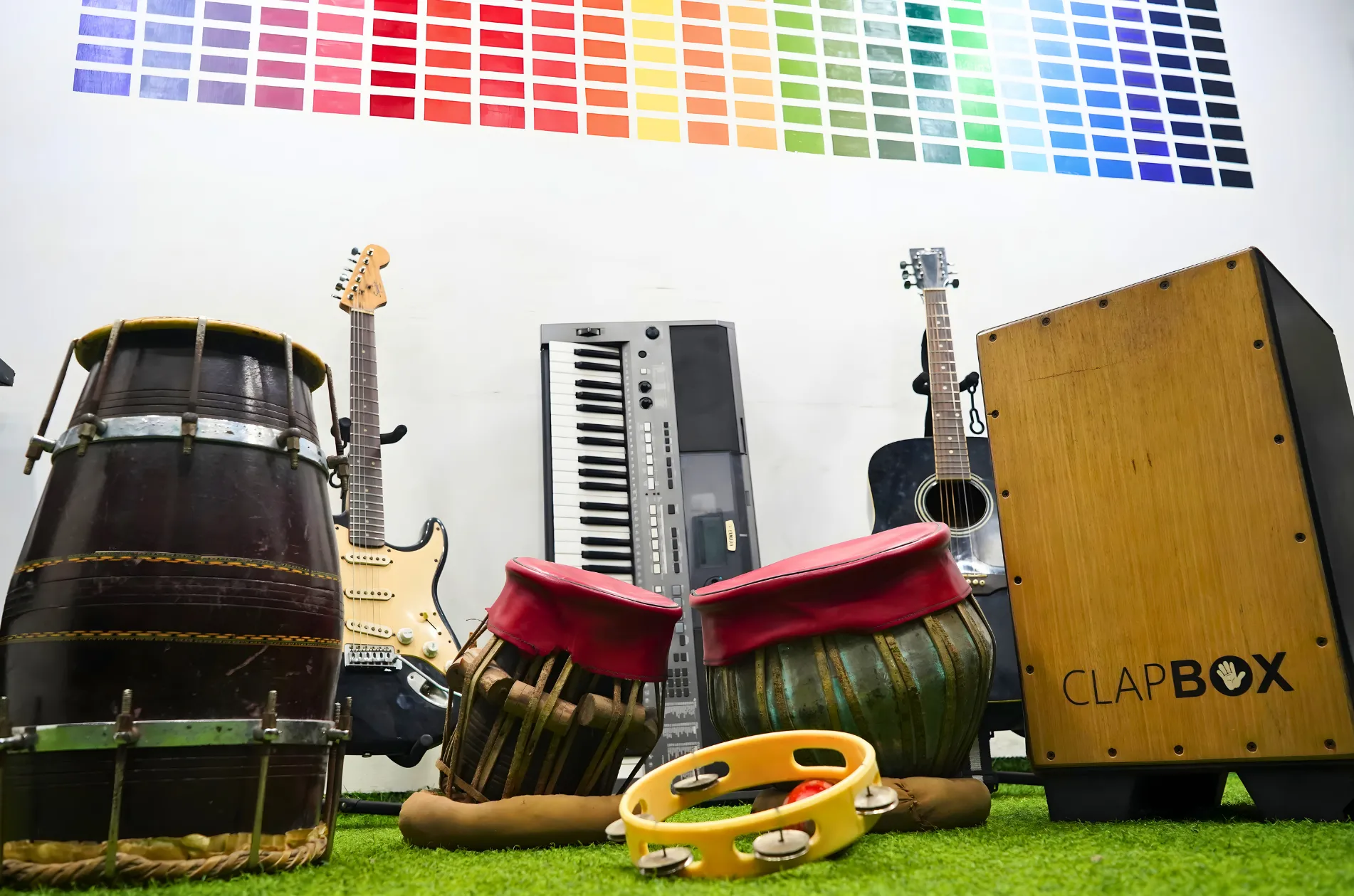 Students rehearsing as a band in the jam room